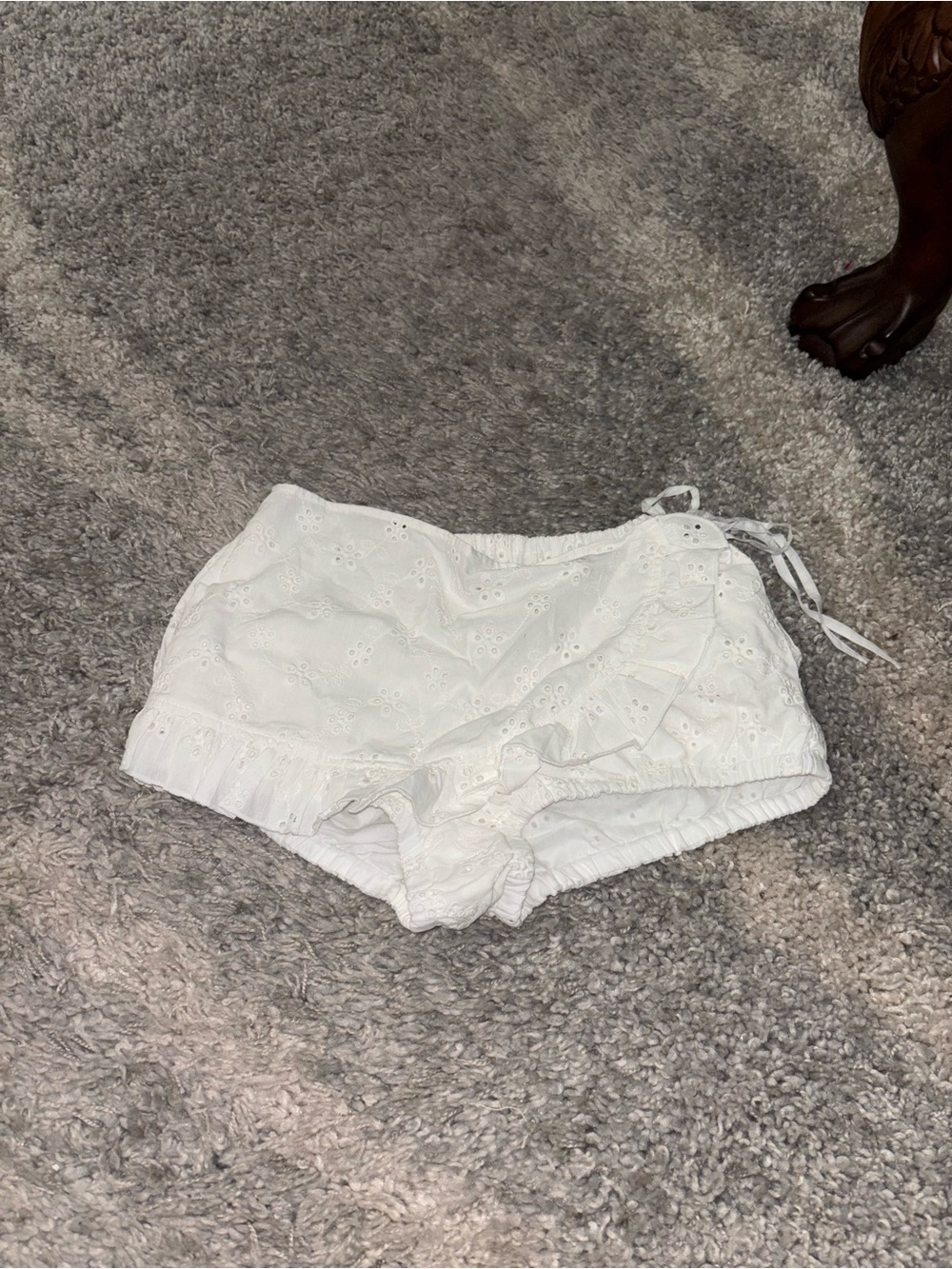 Frankie’s bikinis x Bella Hadid White Eyelet Ruffle Wrap Shorts